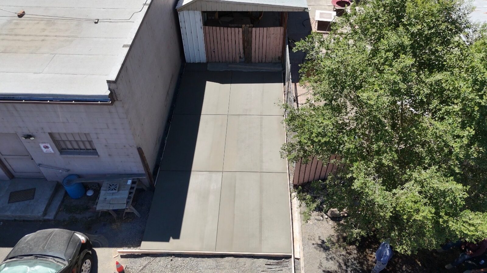 Finished concrete slab beside building