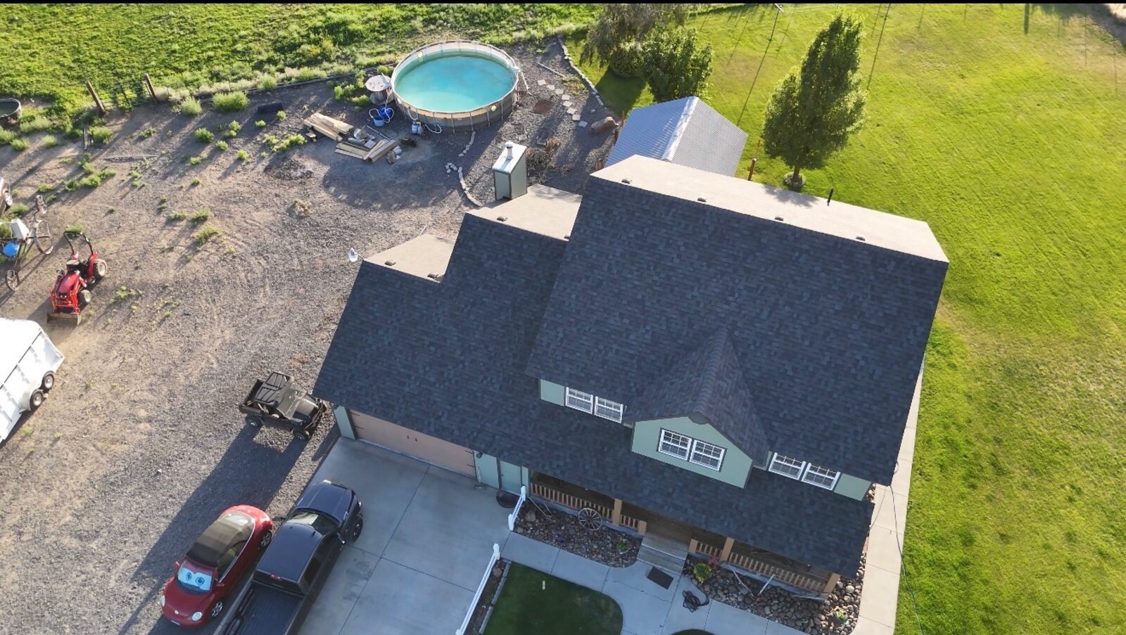 Finished roof on home with pool