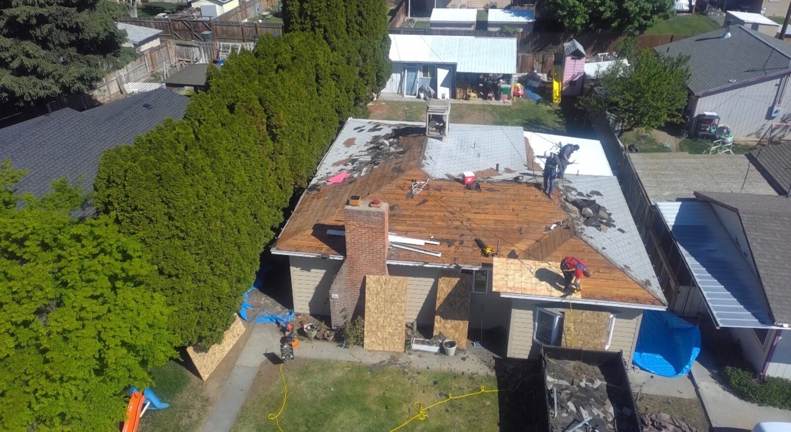 Tear-off down to the deck on in-town home